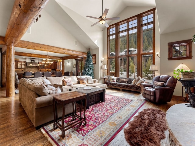 585 Independence Rd, Keystone, CO 80435 - living area with wood-type flooring, ceiling fan, a chandelier, and high vaulted ceiling