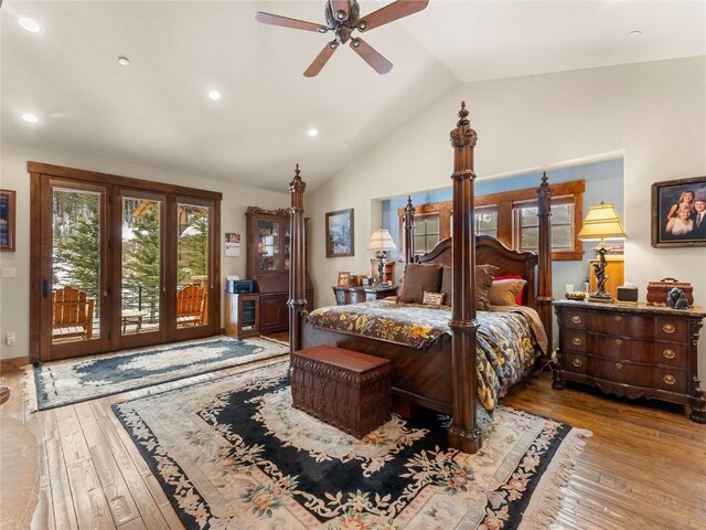 585 Independence Rd, Keystone, CO 80435 - bedroom with lofted ceiling, access to outside, hardwood / wood-style floors, and recessed lighting