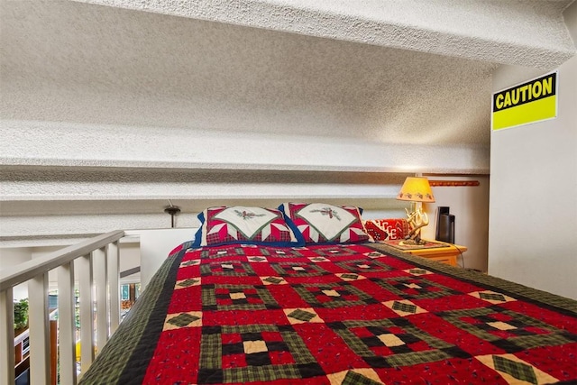 705 Snowberry Ln Unit 303, Breckenridge, CO 80424 - bedroom featuring a textured ceiling