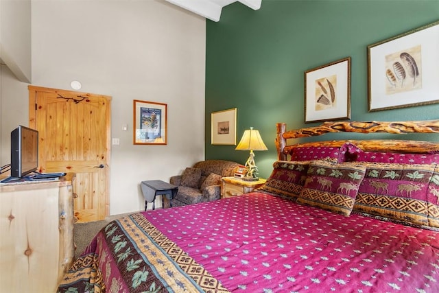 705 Snowberry Ln Unit 303, Breckenridge, CO 80424 - carpeted bedroom featuring a towering ceiling
