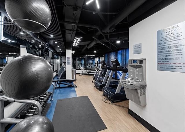 140 Ida Belle Dr Unit 8153, Keystone, CO 80435 - gym featuring wood finished floors and baseboards