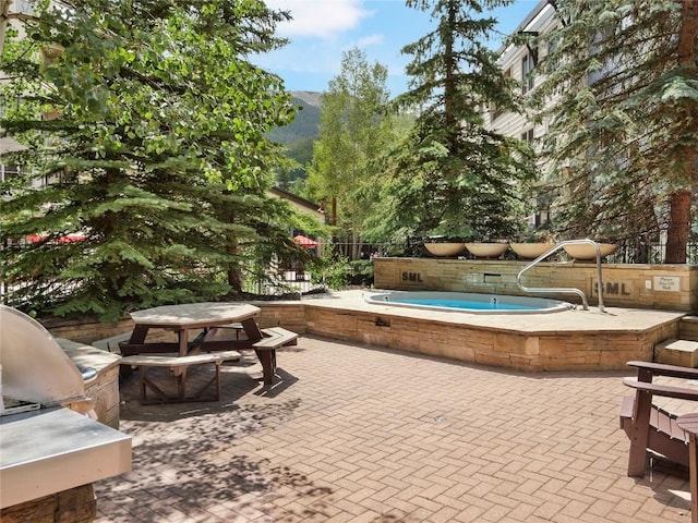 140 Ida Belle Dr Unit 8153, Keystone, CO 80435 - view of swimming pool with a patio area, exterior kitchen, and a swimming pool