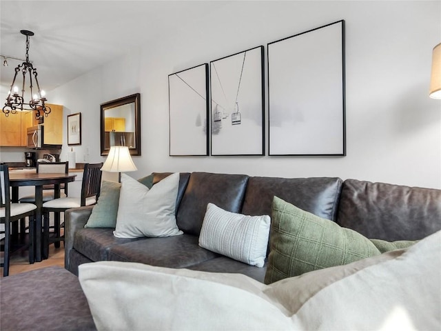 140 Ida Belle Dr Unit 8153, Keystone, CO 80435 - living room with a chandelier and wood finished floors