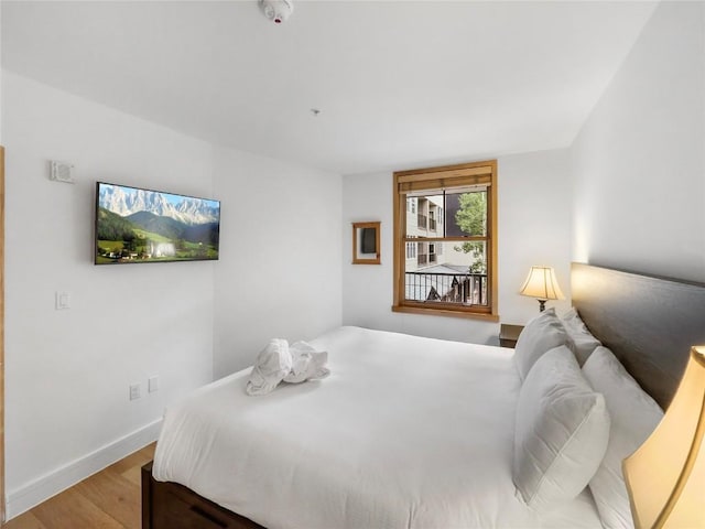 140 Ida Belle Dr Unit 8153, Keystone, CO 80435 - bedroom featuring light wood-style flooring and baseboards