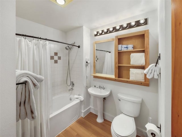 140 Ida Belle Dr Unit 8153, Keystone, CO 80435 - bathroom featuring shower / bath combo with shower curtain and wood finished floors