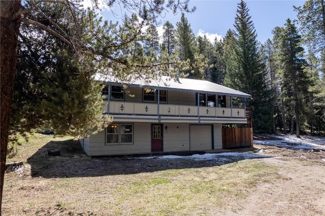 212 Briar Rose Ln, Breckenridge, CO 80424 - rear view of house with a garage
