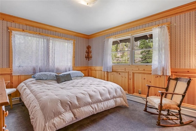 212 Briar Rose Ln, Breckenridge, CO 80424 - bedroom featuring wallpapered walls, dark colored carpet, wainscoting, crown molding, and a baseboard heating unit