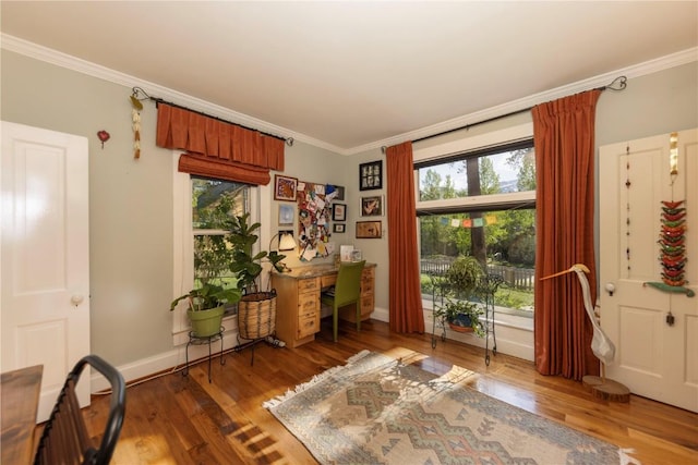 102 S High St, Breckenridge, CO 80424 - living area with ornamental molding, wood finished floors, and baseboards