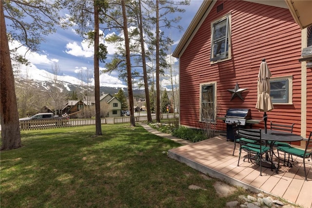 102 S High St, Breckenridge, CO 80424 - view of yard featuring a deck with mountain view and outdoor dining space