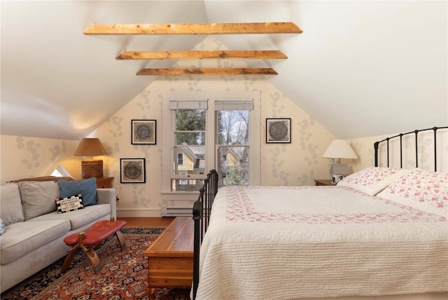 102 S High St, Breckenridge, CO 80424 - bedroom with wood finished floors, baseboard heating, wallpapered walls, and baseboards