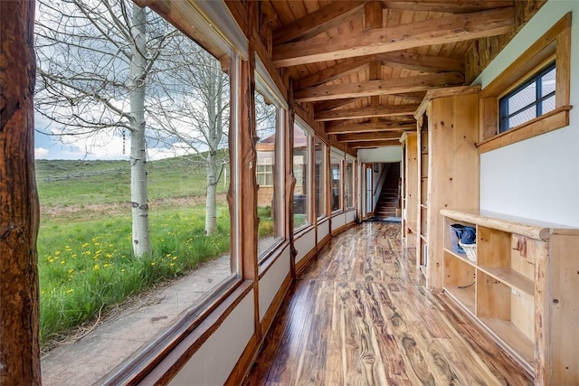 26755 Aspen Ct, Clark, CO 80428 - unfurnished sunroom featuring wood finished floors, healthy amount of natural light, and wood ceiling