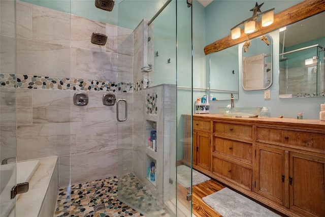 26755 Aspen Ct, Clark, CO 80428 - bathroom featuring a shower stall, vanity, and a tub