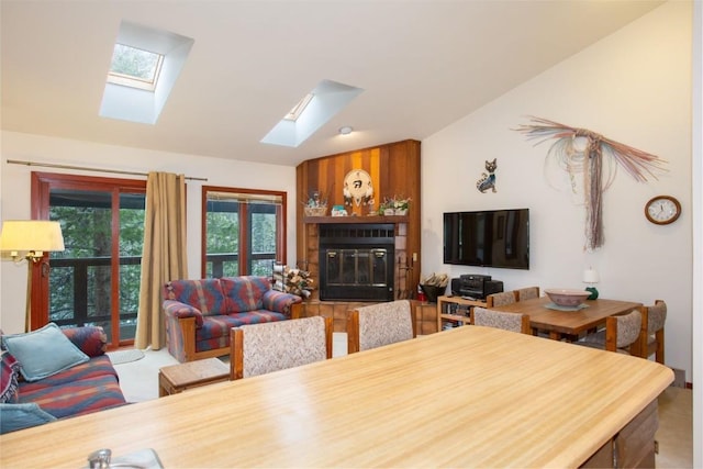 324 W Main St Unit 324, Frisco, CO 80443 - dining area featuring a skylight, a glass covered fireplace, and lofted ceiling