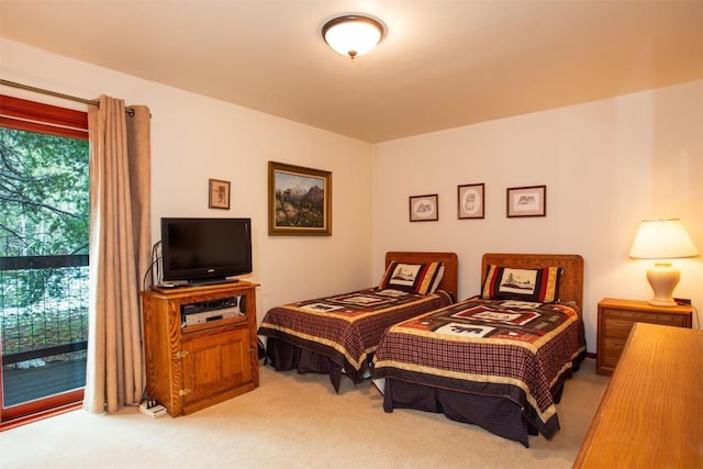 324 W Main St Unit 324, Frisco, CO 80443 - bedroom featuring light colored carpet and access to outside