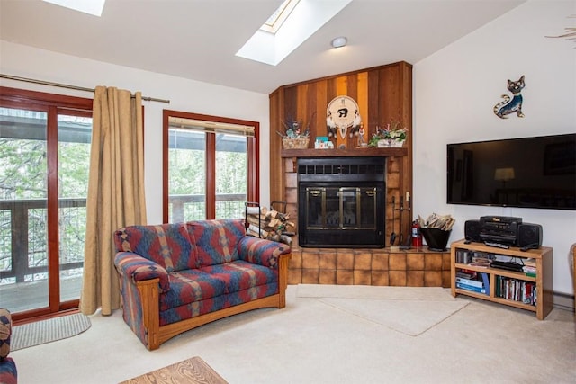 324 W Main St Unit 324, Frisco, CO 80443 - living room featuring a skylight, carpet floors, and a glass covered fireplace