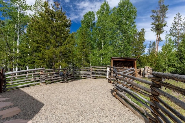view of yard with an exterior structure and an outbuilding