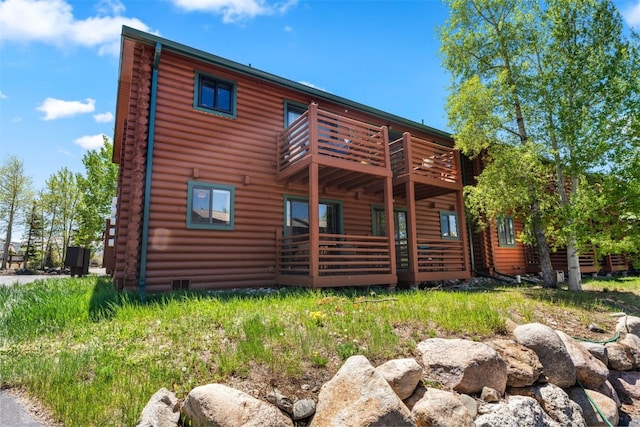 100 Cove Blvd Unit F, Dillon, CO 80435 - back of property featuring a balcony and faux log siding