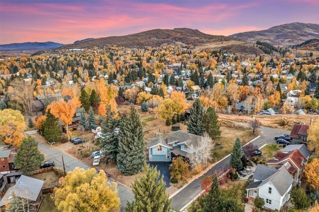 aerial view at dusk with a mountain view