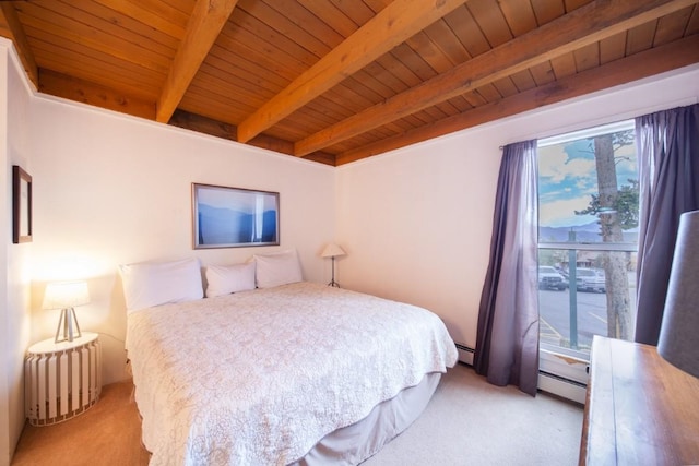 bedroom featuring beam ceiling, multiple windows, wooden ceiling, and a baseboard heating unit