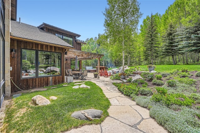 view of yard featuring a pergola and a patio area