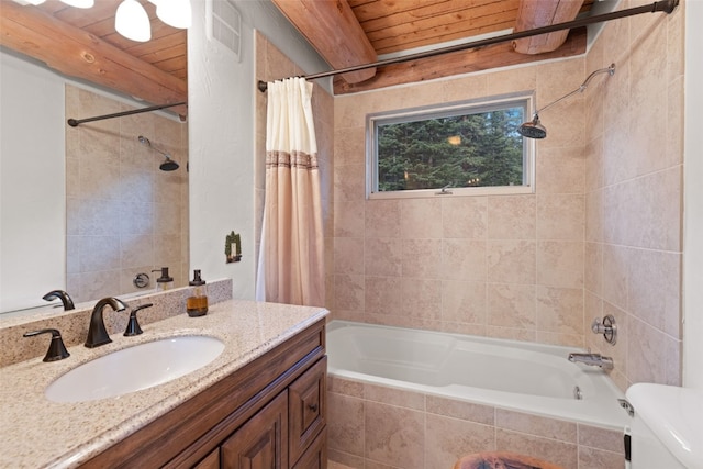 full bath featuring toilet, visible vents, tiled shower / bath combo, wooden ceiling, and vanity