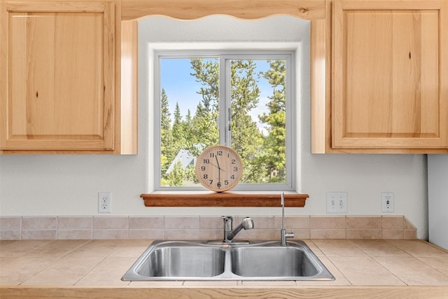 1576 Bobcat Ln, Fairplay, CO 80440 - kitchen with light brown cabinetry, tile counters, and healthy amount of natural light