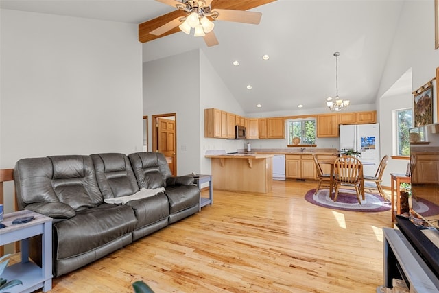 1576 Bobcat Ln, Fairplay, CO 80440 - living area featuring high vaulted ceiling, light wood finished floors, ceiling fan, a chandelier, and recessed lighting