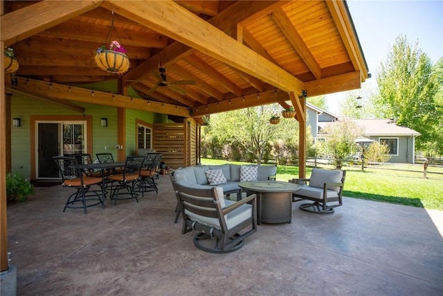 40870 Purple Sage St, Steamboat Springs, CO 80487 - view of patio featuring an outdoor living space with a fire pit, outdoor dining area, and ceiling fan