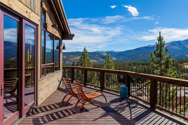 19 Peak 8 Ct, Breckenridge, CO 80424 - wooden deck with a mountain view