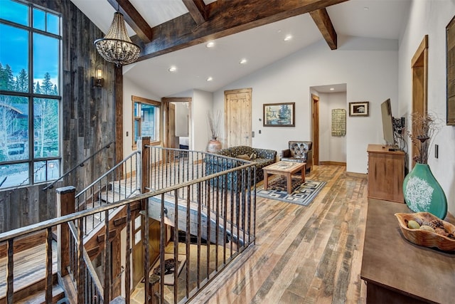 19 Peak 8 Ct, Breckenridge, CO 80424 - hall featuring an upstairs landing, wood-type flooring, beam ceiling, a chandelier, and recessed lighting