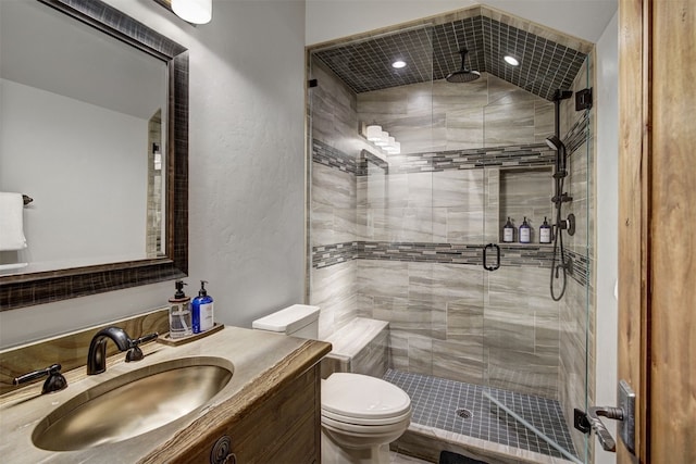 19 Peak 8 Ct, Breckenridge, CO 80424 - bathroom with a shower stall, vanity, and a textured wall