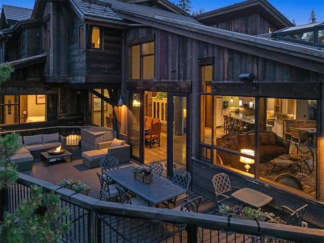 19 Peak 8 Ct, Breckenridge, CO 80424 - rear view of property featuring an outdoor living space with a fire pit, a deck, and outdoor dining space