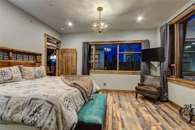 19 Peak 8 Ct, Breckenridge, CO 80424 - bedroom featuring wood finished floors, recessed lighting, and a chandelier
