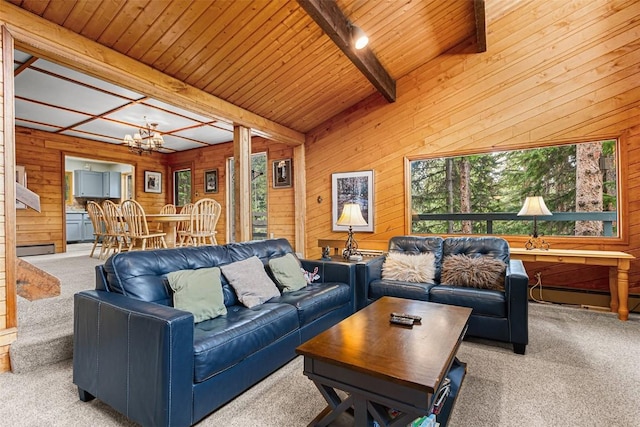 3312 Boreas Pass Rd, Breckenridge, CO 80424 - living room featuring carpet flooring, wooden walls, a chandelier, and wooden ceiling with exposed beams