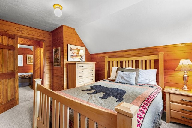 3312 Boreas Pass Rd, Breckenridge, CO 80424 - bedroom with light colored carpet, wood walls, and lofted ceiling
