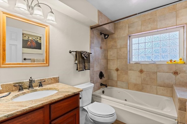 862 Douglas St, Steamboat Springs, CO 80487 - bathroom featuring toilet, vanity, and a combined bath / shower with jetted tub