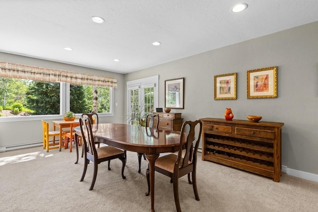 862 Douglas St, Steamboat Springs, CO 80487 - dining room with light carpet, recessed lighting, and baseboards