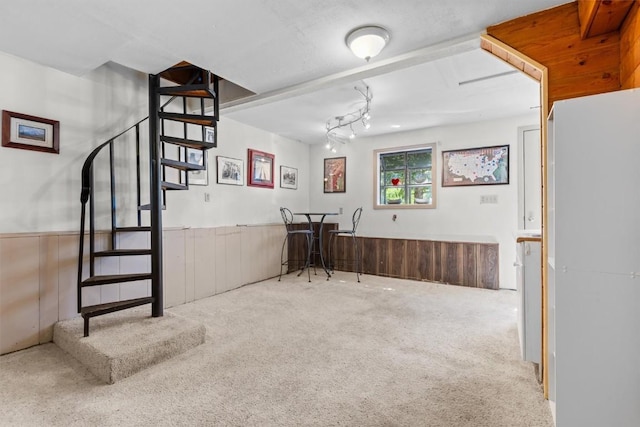 862 Douglas St, Steamboat Springs, CO 80487 - basement featuring stairs, wainscoting, carpet floors, and wooden walls
