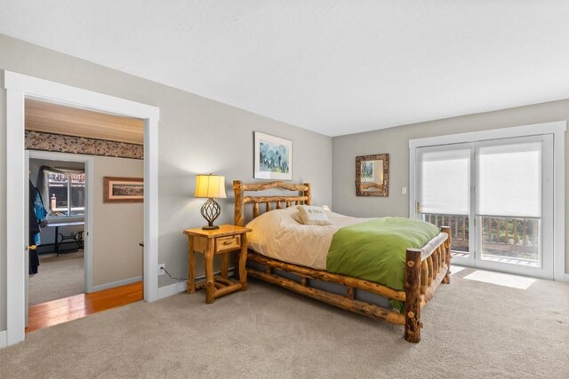 862 Douglas St, Steamboat Springs, CO 80487 - bedroom featuring carpet flooring, access to exterior, and baseboards