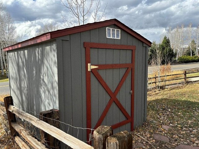 1550 Red Hawk Ct, Steamboat Springs, CO 80487 - view of shed featuring fence
