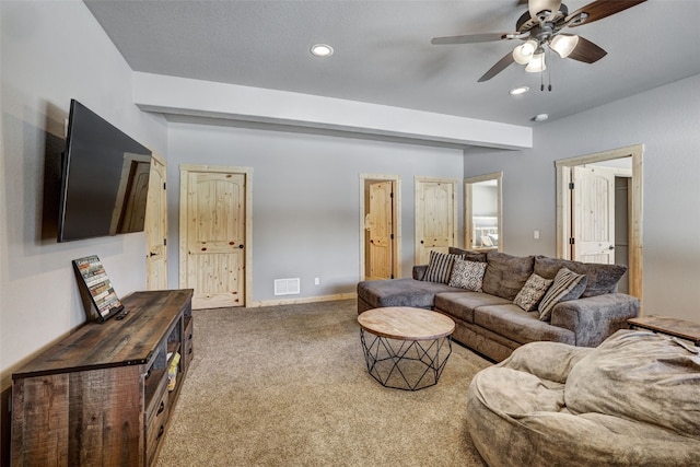 carpeted living room featuring ceiling fan and recessed lighting