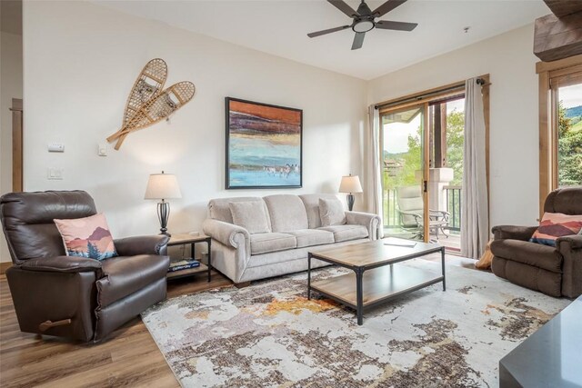 1463 Flattop Cir Unit 302, Steamboat Springs, CO 80487 - living room with wood finished floors and ceiling fan