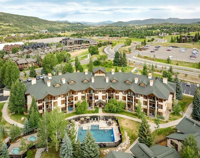 1463 Flattop Cir Unit 302, Steamboat Springs, CO 80487 - aerial overview of property's location featuring a mountain backdrop and a pool area