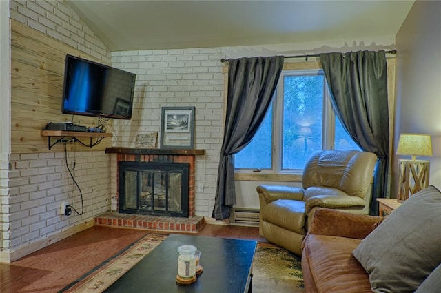 246 Broken Lance Dr Unit 203, Breckenridge, CO 80424 - living room with vaulted ceiling, a fireplace, and a baseboard radiator