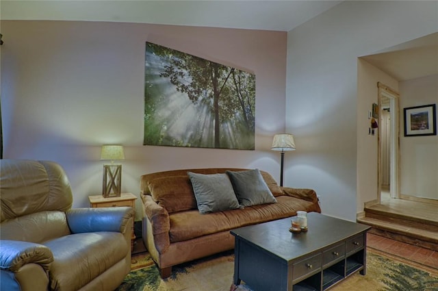 246 Broken Lance Dr Unit 203, Breckenridge, CO 80424 - living area featuring lofted ceiling and light wood-style flooring