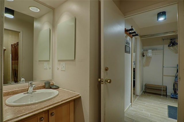 246 Broken Lance Dr Unit 203, Breckenridge, CO 80424 - full bath with vanity and wood finished floors