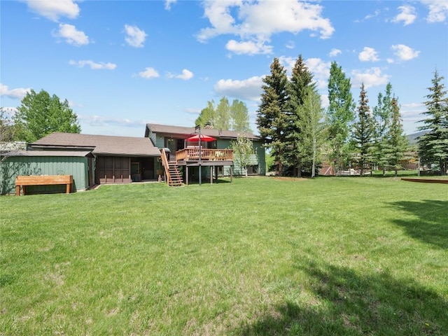 1346 Rainbow Dr, Silverthorne, CO 80498 - view of grassy yard featuring a deck and stairway