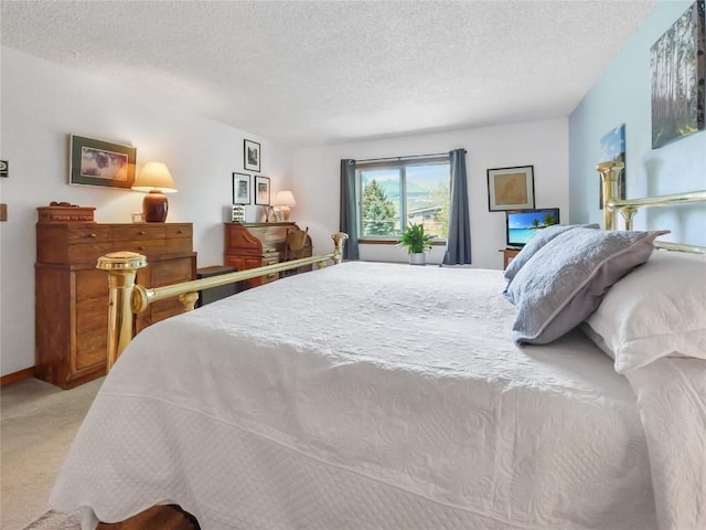 1346 Rainbow Dr, Silverthorne, CO 80498 - bedroom with light carpet and a textured ceiling