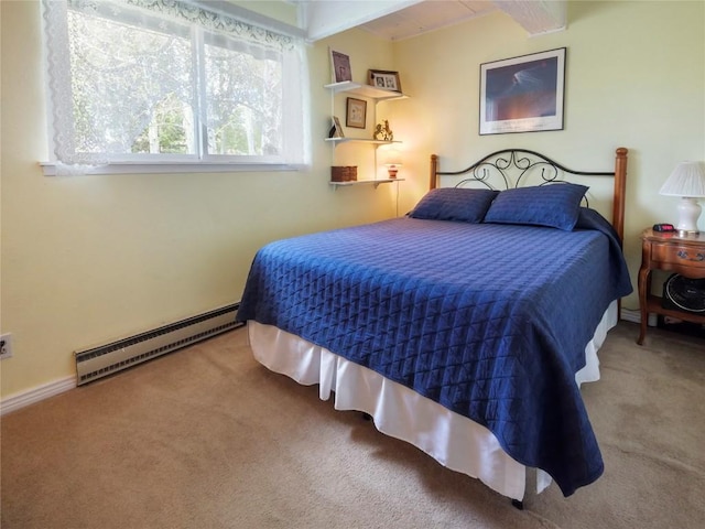 1346 Rainbow Dr, Silverthorne, CO 80498 - bedroom featuring a baseboard radiator, carpet floors, and beam ceiling