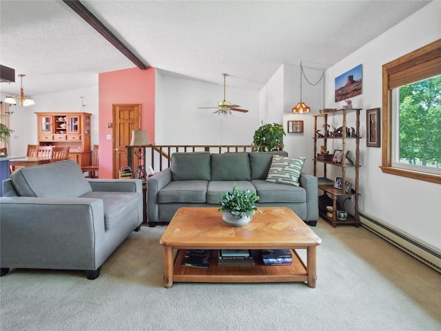 1346 Rainbow Dr, Silverthorne, CO 80498 - carpeted living room featuring ceiling fan, a textured ceiling, a baseboard heating unit, and a chandelier